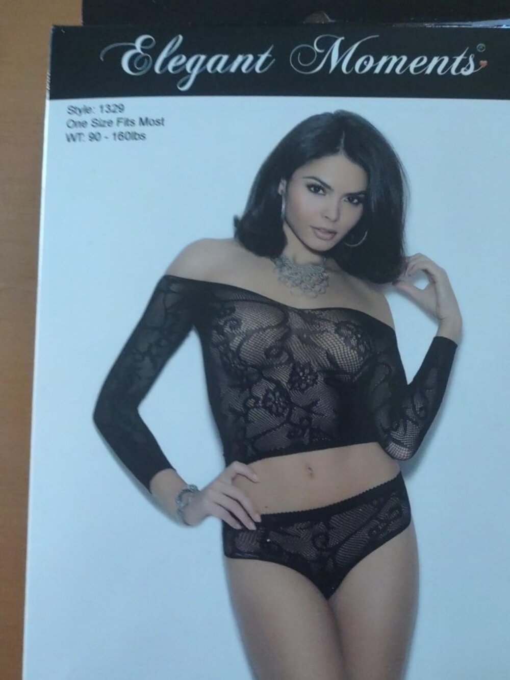 Black lace booty shorts and off the shoulder matching top